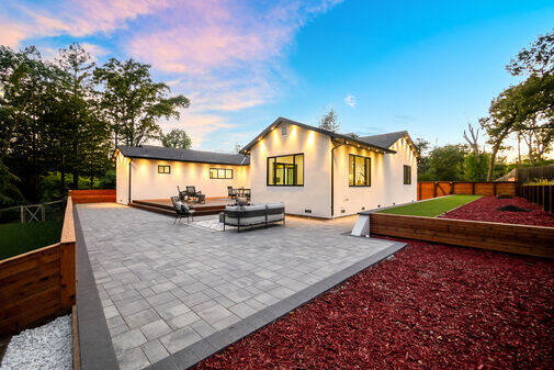 ADU rear elevation with landscaped yard and patio